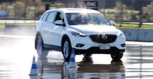 Skid pan driver training with Mazda CX9